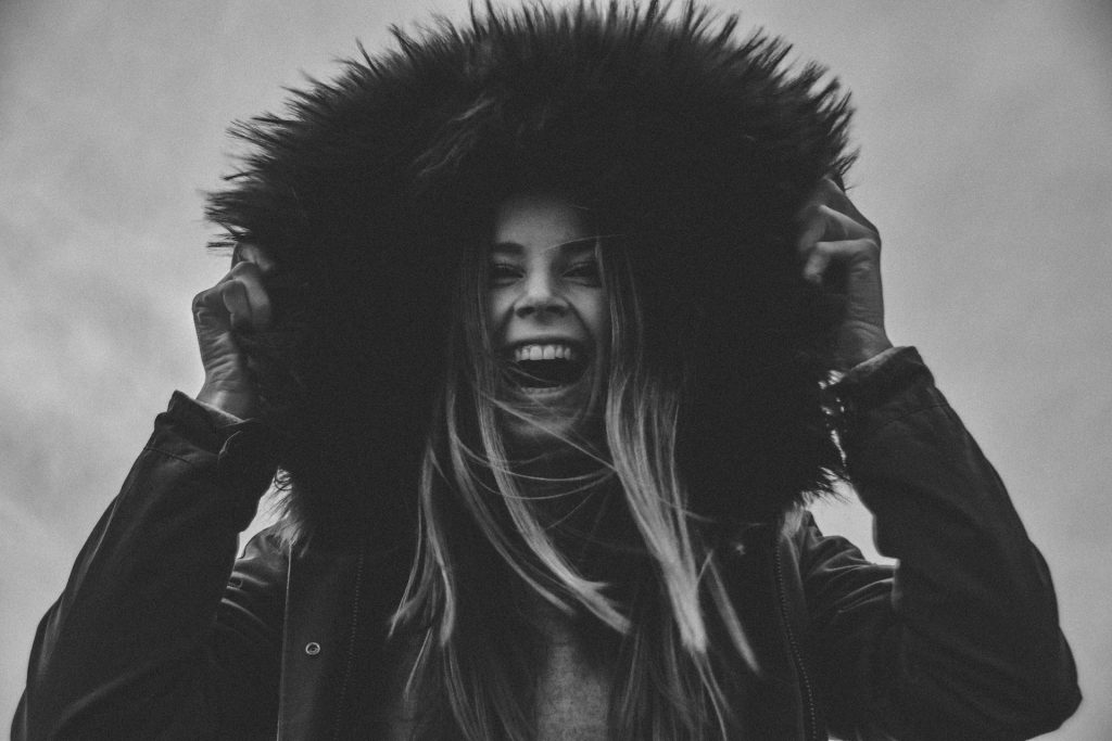 Laughing girl that overcame anxiety When Speaking a Foreign Language.