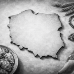 Black-and-white ultrarealistic 16:9 image showing the outline of Poland’s map centered on a textured surface, surrounded by subtle Polish cultural elements such as a plate of pierogi, a patterned folk textile, wheat stalks, and amber beads, with no text or labels visible.